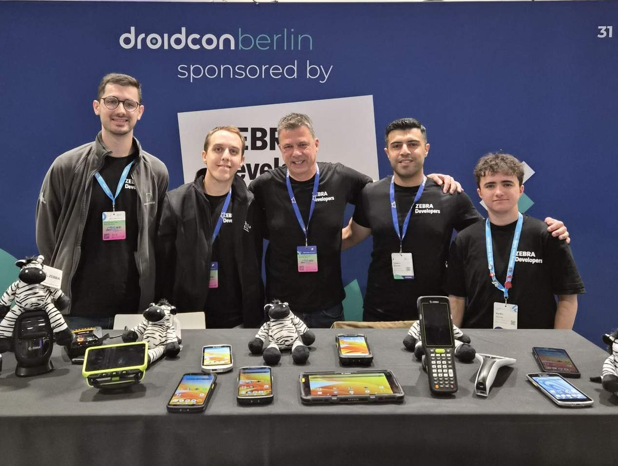The Zebra Devs team at the Zebra booth.